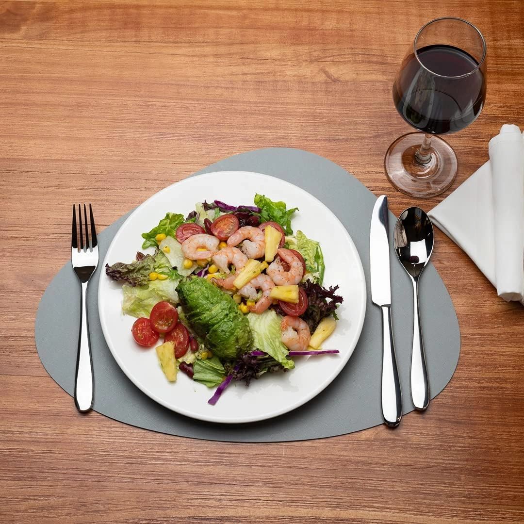 Restaurantware 16 Inch Table Placemats 6 Egg-Shaped Vinyl Placemats - Embossed Stain-Resistant Gray Vinyl Placemats For Tables Leather-Like Feel Protects Surfaces