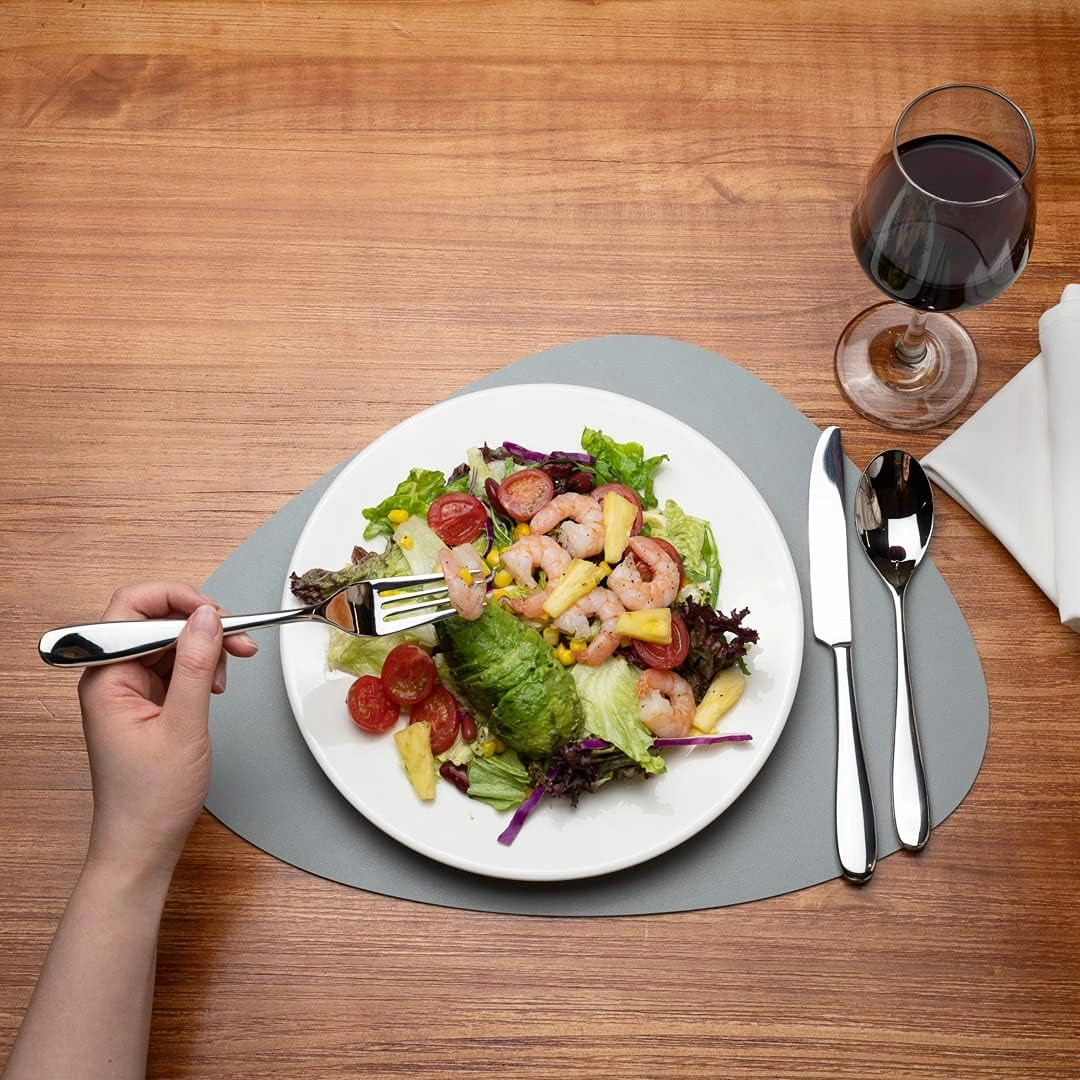 Restaurantware 16 Inch Table Placemats 6 Egg-Shaped Vinyl Placemats - Embossed Stain-Resistant Gray Vinyl Placemats For Tables Leather-Like Feel Protects Surfaces
